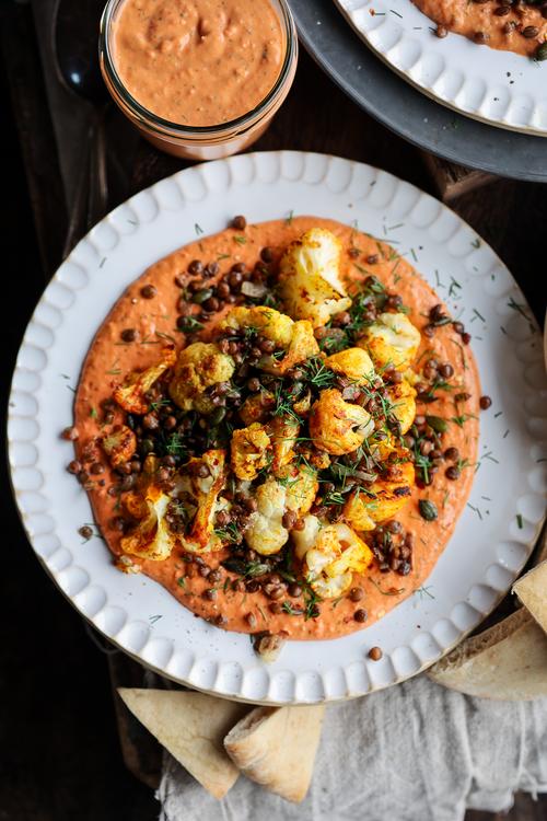 image of Smoky Roasted Cauliflower with Creamy Red Pepper Sauce
