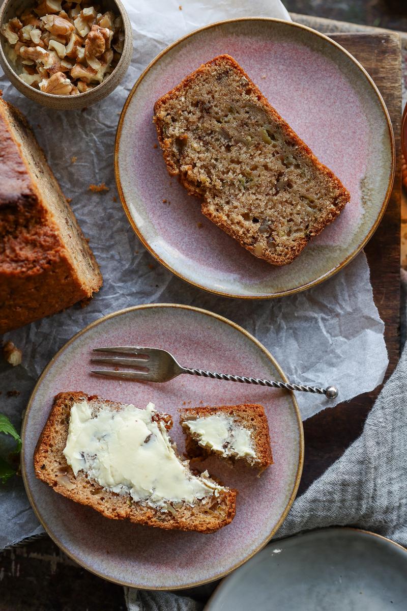 two slices of the vegan courgette bread ready to enjoy for an easy snack