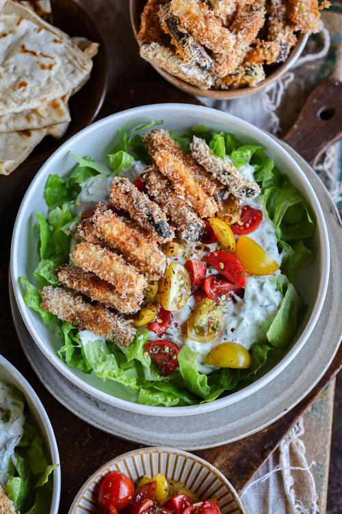 image of Crispy Baked Eggplant & Zucchini Tzatziki Nourish Bowl